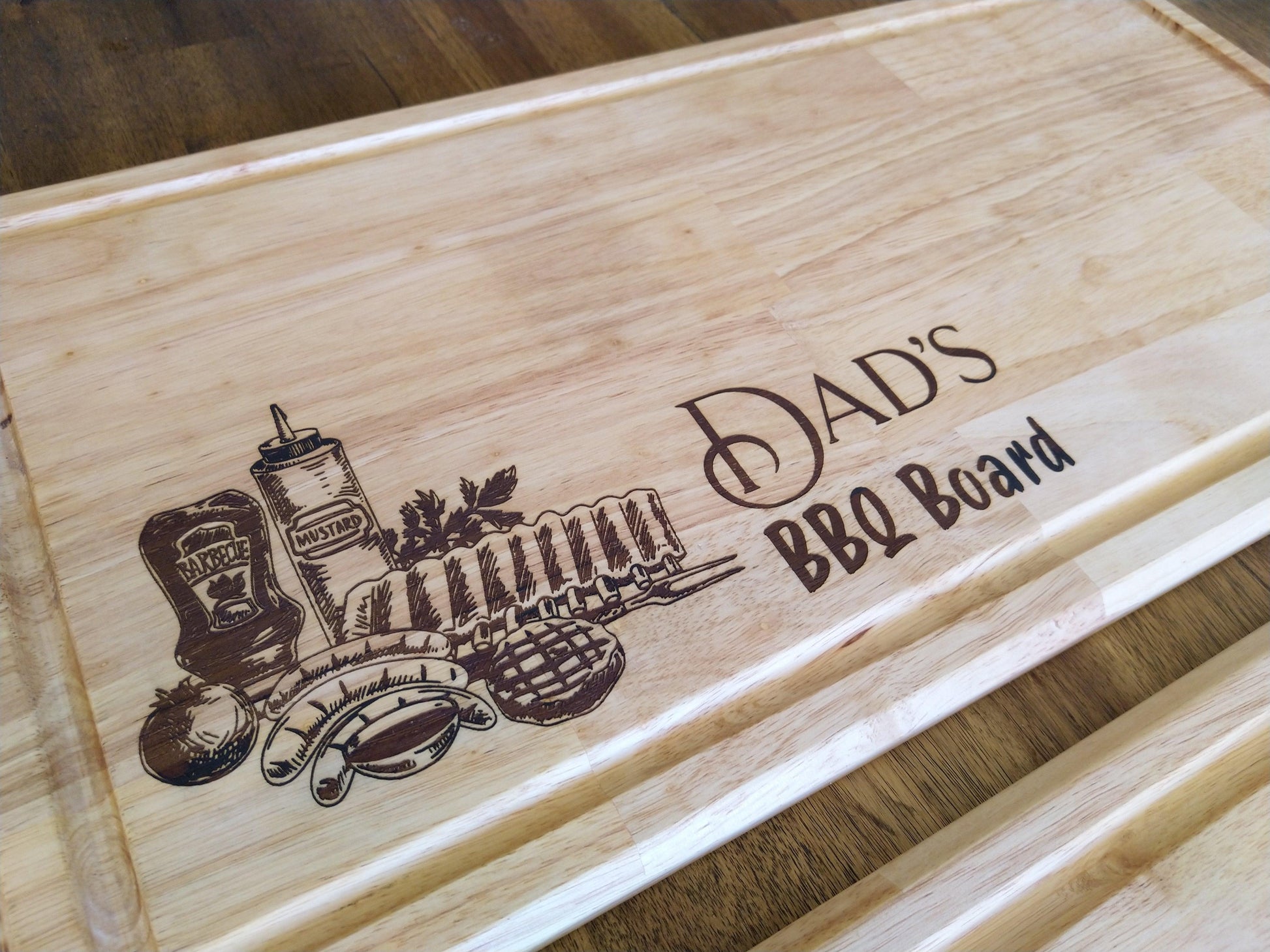 600mm x 300mm - Hevea Chopping Board 'Dads BBQ' - Burning Man Designs